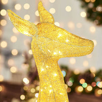 Holiday outdoor reindeer decorations with bows